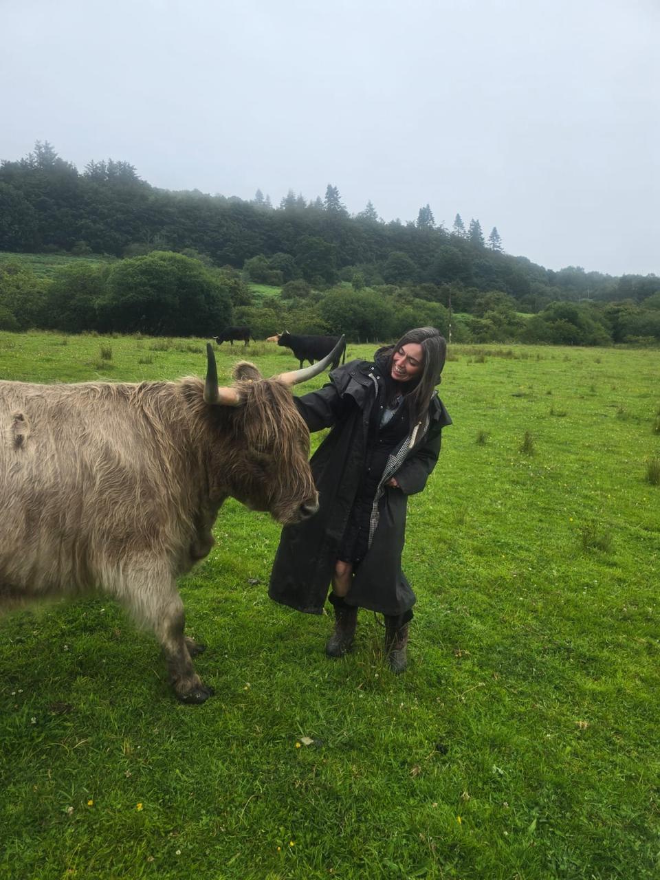 Claire with a Highland cow